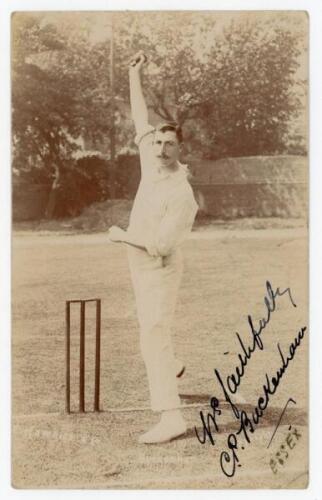 Claude Percival Buckenham. Essex & England 1899-1914. Early sepia real photograph postcard of Buckenham standing full length at the wicket in bowling pose. Very nicely signed in black ink to the image, ‘Yrs. faithfully, C.P. Buckenham’, and again to the v