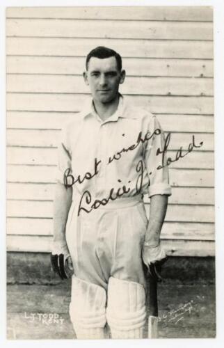 Leslie John Todd. Kent 1927-1950. Mono real photograph postcard of Todd, three quarter length, wearing cricket attire and leaning on his bat. Nicely signed in ink by Todd. B.C. Flemons of Tonbridge. Postally unused. Very good condition.