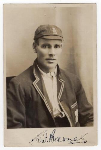 Sydney Francis Barnes. Warwickshire, Lancashire & England 1894-1930. Sepia real photograph postcard of Barnes, seated half length wearing England cap and blazer. Signed in ink to the lower margin by Barnes. Photographer unknown. Postally unused. Pin hole 