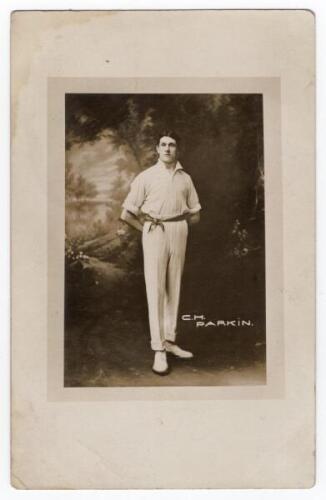 Cecil Harry ‘Cec’ Parkin. Yorkshire, Lancashire & England 1906-1926. Unusual studio portrait of Parkin standing full length weraing cricket attire, in a pastoral landscape setting. Handwritten correspondence to verso, undated, possibly c.1910. Serial no. 