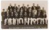 ‘New Zealand & Leicestershire C.C.C. 1931’. Mono real photograph postcard of the two teams for the tour match played at Aylestone Road, Leicester, 9th- 12th May 1931. The players seated and standing in rows wearing assorted blazers. Leicestershire players