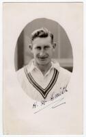 Haydon Arthur Smith. Leicestershire 1925-1939. Mono real photograph postcard of Smith, head and shoulders in cameo, wearing cricket attire. Nicely signed in black ink by Smith to the photograph. Official stamp to verso for A. Wilkes & Son, West Bromwich. 