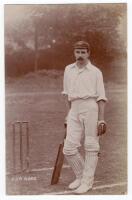 Cecil John Burditt Wood. Leicestershire 1896-1923. Sepia real photograph photograph of Wood standing full length at the wicket wearing cricket attire and County cap, leaning on his bat. Foster of Brighton, possibly c.1905. Postally unused. Some age toning