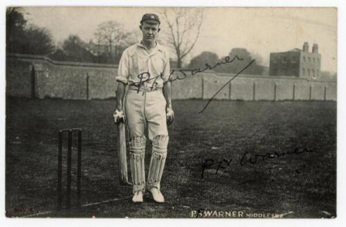 Pelham Francis ‘Plum’ Warner. Oxford University, Middlesex & England 1894-1920. Mono real photograph postcard of Warner standing full length at the wicket, bat in one hand, wearing Middlesex cap. Nicely signed twice in black ink to the image by Warner. Ha