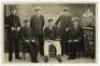 Nottinghamshire 1930s. Unusual mono real photograph postcard of seven Nottinghamshire cricketers seated and standing, posing in naval and police uniforms, and one dressed as a clown. Players featured include Knowles, G. Gunn, G.V. Gunn, A. Staples, Heane,