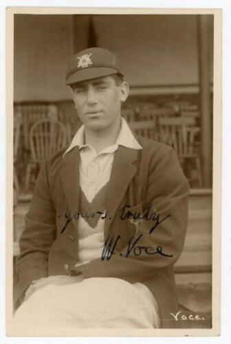 William ‘Bill’ Voce. Nottinghamshire & England 1927-1952. Sepia real photograph postcard of Voce seated three quarter length wearing Nottinghamshire cap and blazer at Trent Bridge, probably c.1930. C.H. Richards, Nottingham. Very nicely signed in ink to t