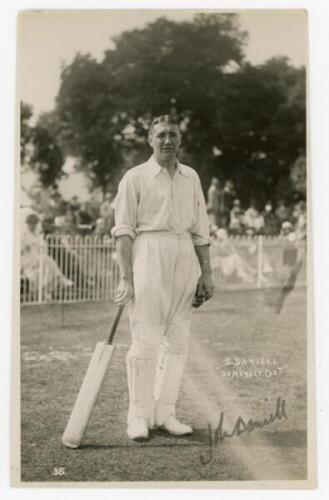 John Daniell. Somerset & Cambridge University 1898-1927. Mono real photograph post card of Livsey standing full length on the outfield, leaning on his bat. Bailey of Bournemouth. No. 38. Incorrectly titled ‘S. Daniell “Somerset Capt”’. Signed in black ink