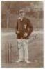 William Charles ‘Razor’ Smith. Surrey 1900-1914. Early mono real photograph postcard of Smith standing full length at the wicket wearing cricket attire and Surrey cap and blazer, cigar in hand. Signed in black ink to the photograph by Smith. Appears to be