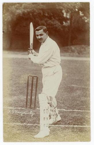 Kumar Sri Ranjitsinhji. Cambridge University, Sussex & England 1893-1920. Excellent original sepia real photograph postcard of Ranjitsinhji standing full length at the crease, bat raised in batting pose. Photograph by Foster of Brighton with blind embosse