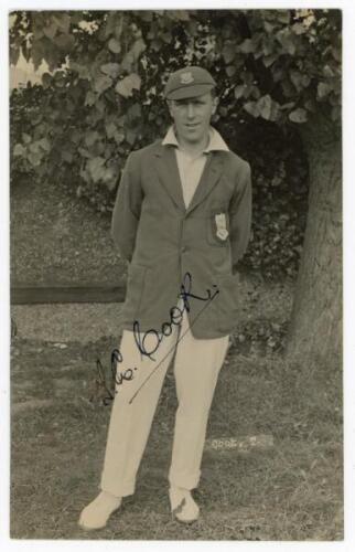 Thomas Edwin Reed ‘Tommy’ Cook. Sussex 1922-1937. Excellent original mono real photograph postcard of Cook standing full length wearing Sussex blazer and cap. The postcard very nicely signed in black ink to the image by Cook. Blind embossed stamp to lower