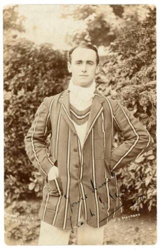 Frank Garfield Stephens. Warwickshire 1907-1912. Original early sepia real photograph postcard of Stephens standing three quarter length wearing cricket attire and striped blazer. Nicely signed in black ink to the photograph by Stephens and dated 1911. E.