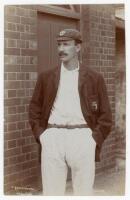 Frederick Lloyd Bowley. Worcestershire 1899-1923. Excellent early sepia real photograph postcard of Bowley standing three quarter length wearing cricket attire, Worcesterhire cap and blazer. E. Hawkins & Co., Brighton. Postally unused. A beautiful image i