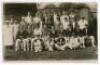 Yorkshire C.C.C. 1925. Sepia real photograph postcard of two teams and officials, seated and standing in rows in caps and blazers. Ink annotation to verso describes the match as ‘Yorkshire C.C.C. v York Council XV 1925’, with ‘1925’ also annotated to the 