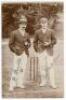 David Denton (Yorkshire & England 1894-1920) and Wilfred Rhodes (Yorkshire, Europeans & England 1899-1930). Early sepia realy photograph postcard of Denton and Rhodes standing together full length wearing cricket attire and blazers, Denton with a straw bo