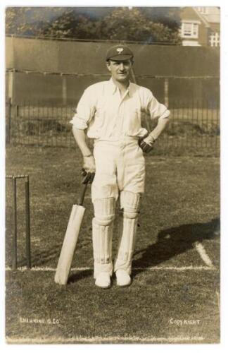 Ellis Pembroke Robinson. Yorkshire & Somerset 1934-1952. Original sepia real photograph postcard of Robinson standing full length at the crease, wearing cricket attire and Yorkshire cap, leaning on his bat. E. Hawkins & Co., Brighton. Postally unused. Sli