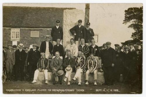 ‘Hambledon v. England played on Broadhalfpenny Down Sept 10, 11, 12 1908’. Rare mono real photograph postcard showing players from the first class match sitting and standing on the granite pillar which was unveiled on the opening day to honour the Hambled