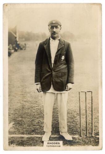 Wilfred Rhodes. Yorkshire & England 1898-1930. Phillips ‘Pinnace’ premium issue cabinet size real photograph trade card of Rhodes standing full length at the wicket wearing Yorkshire cap and blazer. No. 54.C. 4”x6”. Plain back. Creasing to top left corner