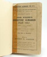 Wisden Cricketers’ Almanack 1917. 54th edition. Original paper wrappers, bound in brown boards, with gilt titles to spine. Wrappers a little faded, old tape marks to edges, some small loss to extremities of wrappers, nicks to page edges of odd pages other