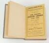 Wisden Cricketers’ Almanack 1916 and 1917. 53rd and 54th editions. Original paper wrappers, the two volumes bound together in green boards with title and date to spine in gilt, red speckled page edges. Some fading to green boards. Very good condition. Rar