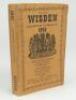 Wisden Cricketers’ Almanack 1945. 82nd edition. Original limp cloth covers. Only 6500 paper copies printed in this war year. Slightly cocked spine to the right , some soiling to rear cover, signature and date of ownership to first advertising page otherwi