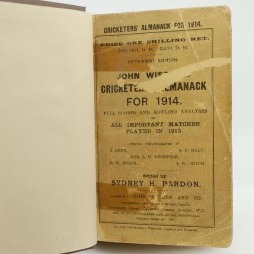 Wisden Cricketers’ Almanack 1914 and 1921. 51st & 58th editions. Both editions bound in dark brown boards, with original paper wrappers, with gilt titles to spine. The 1914 edition with wear and age toning to wrappers, loss of text to front wrapper and ol