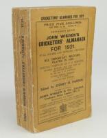 Wisden Cricketers’ Almanack 1921. 58th edition. Original paper wrappers. Some age toning, wear and darkening to wrappers and spine paper, some breaking to internal hinges, slight loss and wear around the spine area otherwise in good+ condition.