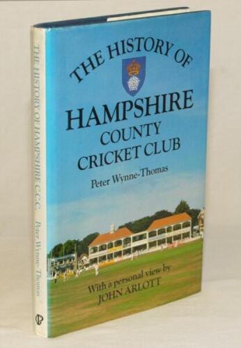 ‘The History of Hampshire County Cricket Club’. Peter Wynne-Thomas. Christopher Helm, Bromley 1988. Hardback with dustwrapper. Profusely signed to the pages or to pieces/ labels laid down to the endpapers, title pages and throughout by over two hundred Ha