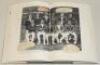 ‘The History of Middlesex County Cricket Club’. David Lemmon. Christopher Helm, Bromley 1988. Hardback with dustwrapper. Profusely signed to the pages or to pieces/ labels and the odd cutting, laid down to the endpapers, title pages and throughout by over - 4
