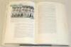 ‘The History of Warwickshire County Cricket Club’. Jack Bannister. Christopher Helm, Bromley 1990. Hardback with dustwrapper. Profusely signed to the pages or to pieces/ labels and the odd cutting, laid down to the endpapers, title pages and throughout by - 5