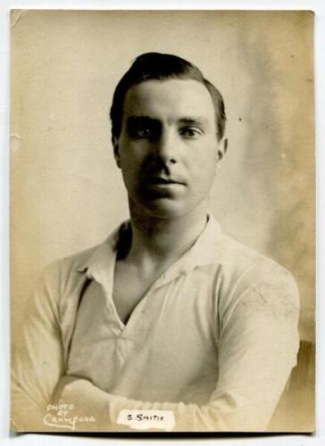 Bertram Smith. Tottenham Hotspur 1919-1930. Mono real photograph postcard of Smith, head and shoulders, in Spurs jersey. W.J. Crawford of Edmonton plain back postcard. Slightly larger than normal postcard size. Postally unused. Good/very good condition.