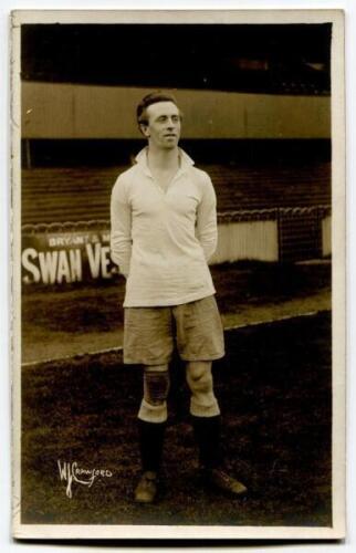 William Sage. Tottenham Hotspur 1919-1925. Sepia real photograph postcard of Sage, full length, in Spurs attire in front of the main stand. W.J. Crawford of Edmonton postcard. Postally unused. Good/very good condition.