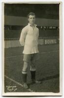 Hugh Harper Lorimer. Tottenham Hotspur 1919-1921. Mono real photograph postcard of Lorimer, full length, wearing Spurs attire in front of the main stand. W.J. Crawford of Edmonton postcard. Postally unused. Slight silvering otherwise in good/very good con