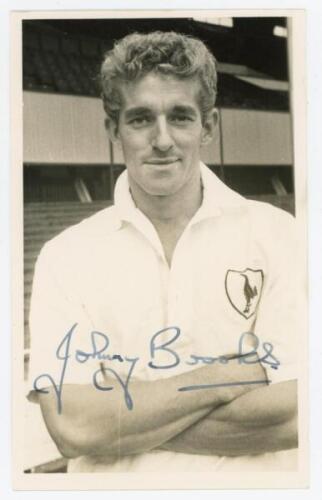 John Brooks. Tottenham Hotspur 1953-1959. Mono real photograph plainback postcard of Brooks, half length, in Spurs attire. Nicely signed in ink ‘Johnny Brooks’ to image. Publisher unknown. Postally unused. Very good condition.