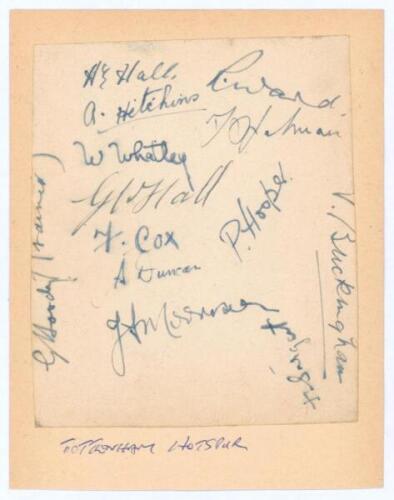 Tottenham Hotspur F.C. 1938/39. Album page signed in ink by thirteen members of the playing staff and trainer. Signatures include A.E. Hall, Cox, Ward, G.W. Hall, Hooper, Spelman, Duncan, Buckingham, Hitchins etc. Page laid down to larger page. G.