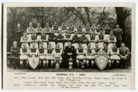 ‘Arsenal Football Club 1937’. Mono real photograph postcard of the Arsenal team, staff and management standing and sitting in rows displaying trophies in front including the F.A. Cup. Title and players names to lower border. Postcard by Lambert Jackson. P