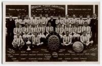 ‘Brighton & Hove Albion Football Club 1910-11’. Mono real photograph postcard of the Brighton playing staff and officials, standing and sitting in rows on the pitch displaying various trophies including F.A. Charity Shield. Carter Brothers and Pannell of 