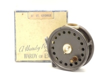 A Hardy St George 3 3/8" trout fly reel, ebonite handle, alloy foot, white agate line guide (no cracks), two screw drum latch and Mk.II check mechanism, light wear only, in cream card box, 1950's