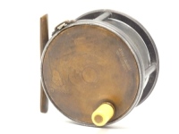 A scarce Hardy Brass Faced Perfect 3 ¼" light salmon fly reel, ivorine handle, brass foot, strapped rim tension screw and early calliper spring check mechanism, slightly dished drum with four rim cusps and milled nickel silver locking screw, faceplate st