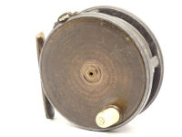 A scarce Hardy Brass Faced Perfect 3 3/8" trout fly reel, domed ivorine handle, brass foot (shortened at one end), strapped rim tension screw and early calliper spring check mechanism, contracted drum with four rim cusps and milled nickel silver locking s