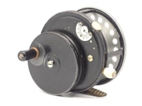 A rare Hardy Super Silex 3 ½" "wartime" finish bait casting reel, tapered ebonite handle on off-set circular drive plate, ribbed brass foot, "spitfire" finish alloy shallow cored drum with jewelled spindle bearing and spring release latch, black painted 