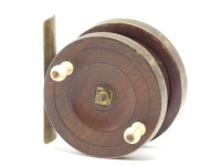 An early Nottingham 3" centre pin reel, solid treen drum with twin baluster turned bone handles and brass spindle locking nut, twin brass banded rims and brass stancheon foot, rare example dating from circa 1850's, see Duma S.: Men of Trent pg. 151