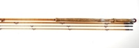 A Hardy "Hollolight" 3 piece (2 tips) hollow built cane salmon fly rod, 12'6", gold/black tipped silk wraps, gold inter-whippings, gold anodised sliding screw grip reel fitting, studlock joints, mid-section upper ferrule re-whipped, 1959, in bag