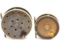 A Slater S.E.J. Flyfisher's Winch 3" brass and ebonite trout fly reel, tapered horn handle, German silver rims, brass bridge foot, triple drum pillars, faceplate engraved make and model details and a Carter & Co. brass and ebonite 3 ½" salmon fly reel, p