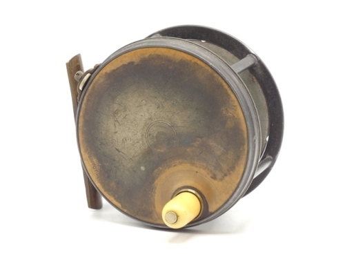 A good Hardy Perfect Brass Faced 4 ¼" salmon fly reel, domed ivorine handle, pierced brass foot, strapped rim tension screw with Turk's head locking nut and 1906 calliper spring check mechanism, slightly contracted drum with four rim cusps and milled nick