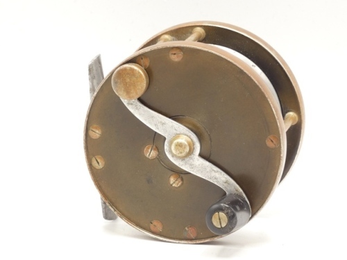 A scarce Edward Vom Hofe Tobique 1/0 multiplying salmon fly reel, ebonite and nickel silver construction, 2:1 ratio retrieve, serpentine counter-balanced crank handle, pierced alloy foot, stamped model details and date stamp V.401 (1929), triple nickel s