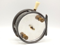 A good Hardy Sea Silex 5" sea centre pin reel, duralumin drum with twin reverse tapered ebonite handles and nickel silver telephone release latch, brass foot, rim mounted ivorine brake lever and two further rim mounted casting controls, light wear to fin