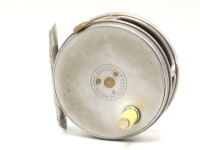 A Hardy Perfect 2 7/8" trout fly reel, ivorine handle, alloy foot, milled rim tension screw with Mk.I check mechanism, faceplate stamped central circular logo, one pillar with line groove, wear to finish from normal use, circa 1918