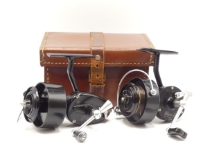 A scarce Mitchell 300 third model fixed spool reel in fitted leather case, half bail arm, turned metal tapered folding handle, butterfly shaped anti-reverse lever, spare spool, only very light signs of use, with original leaflet and in fitted block leat