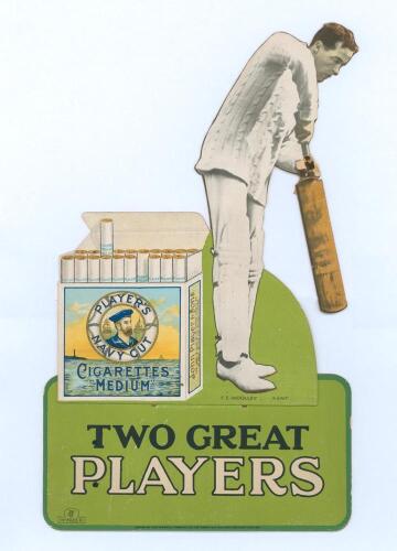 ‘Two Great Players’ c.1930s. Original colour advertising display card produced by for John Player & Sons Navy Cut cigarettes depicting a partially cut-out figure of Frank Woolley in batting pose beside a cigarette packet, on a green background. Issued by 