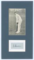 Wilfred Rhodes. Yorkshire, Europeans & England 1898-1930. Excellent signature in black ink of Rhodes on piece laid down and window mounted below a mono postcard of Rhodes in batting pose at the crease. Publisher unknown. Very good condition